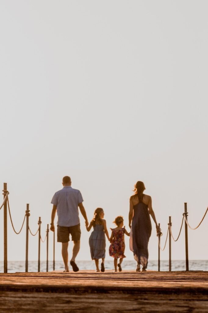 family, walk, beach, holding hands, walking, baby, kids, children, love, nature, adorable, childhood, dad, mom, mother, father, parents, sunset, together, bonding, leisure, happiness, vacation, holiday, portrait, family portrait